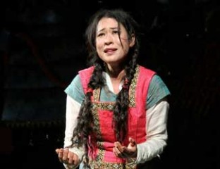 Hyeseoung Kwon performs the role of Liù in Handa Opera on Sydney Harbour — Turandot Photo credit: Prudence Upton